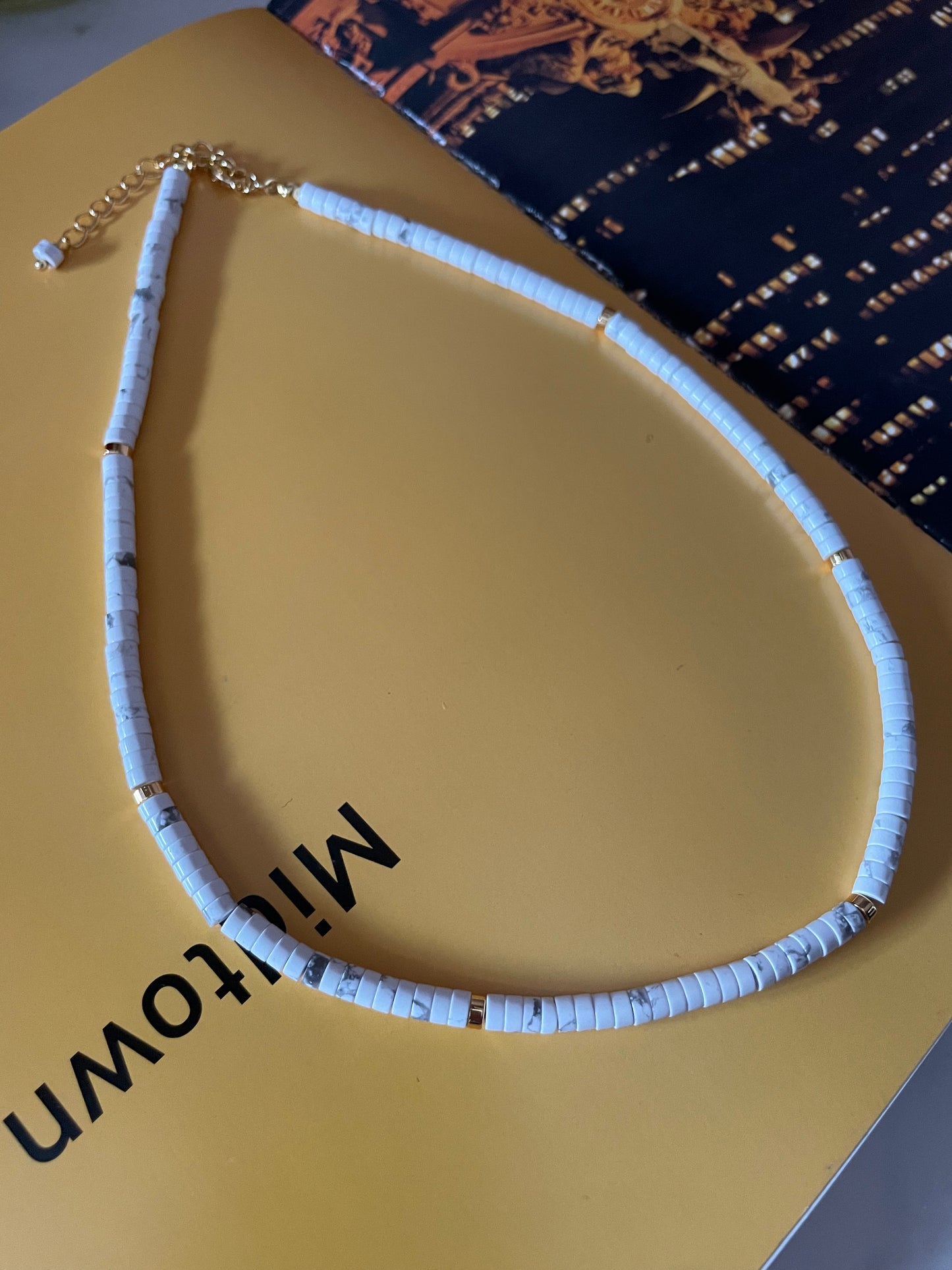 White beaded necklace 62