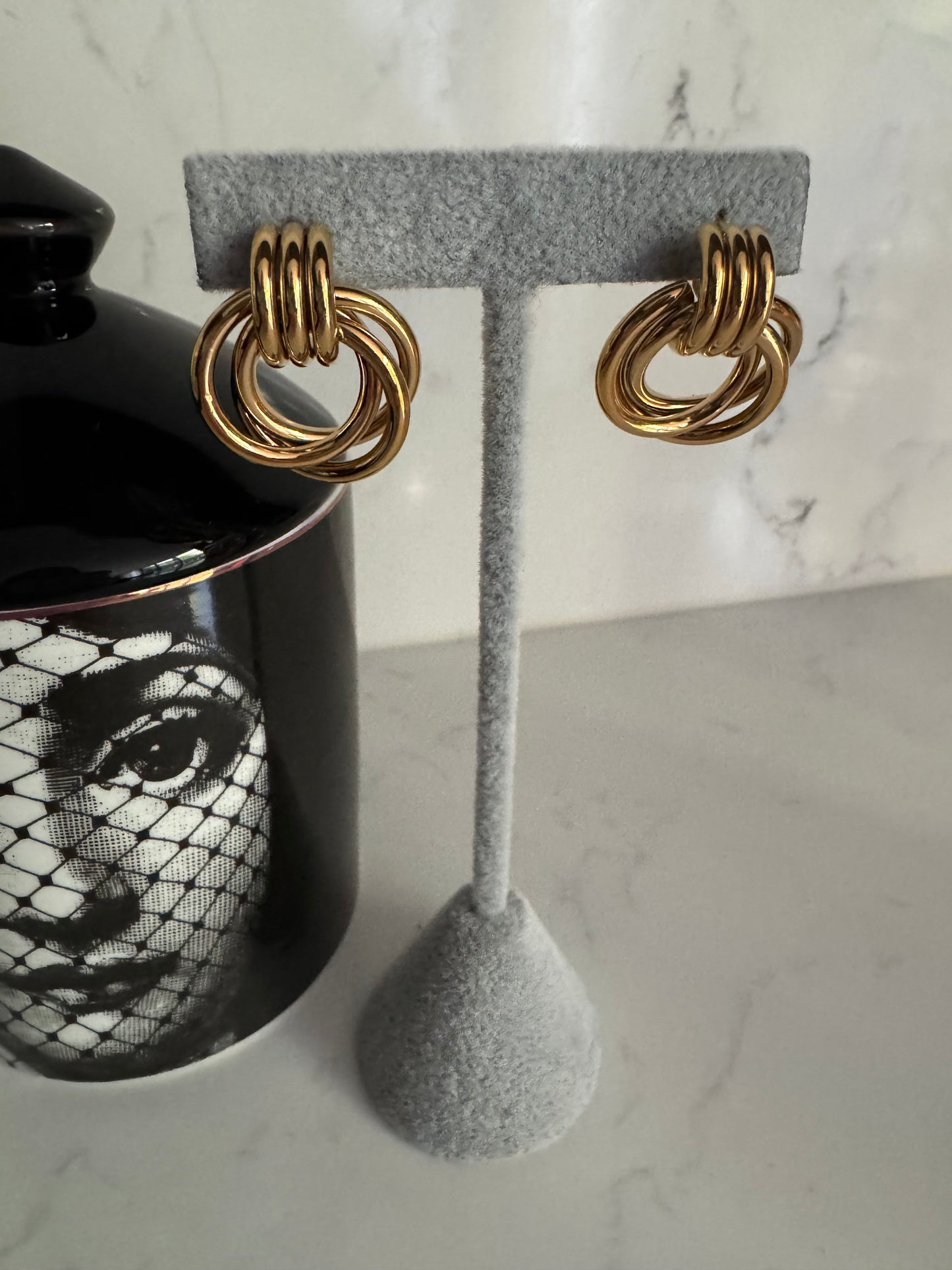 Double knotted gold hoop B29