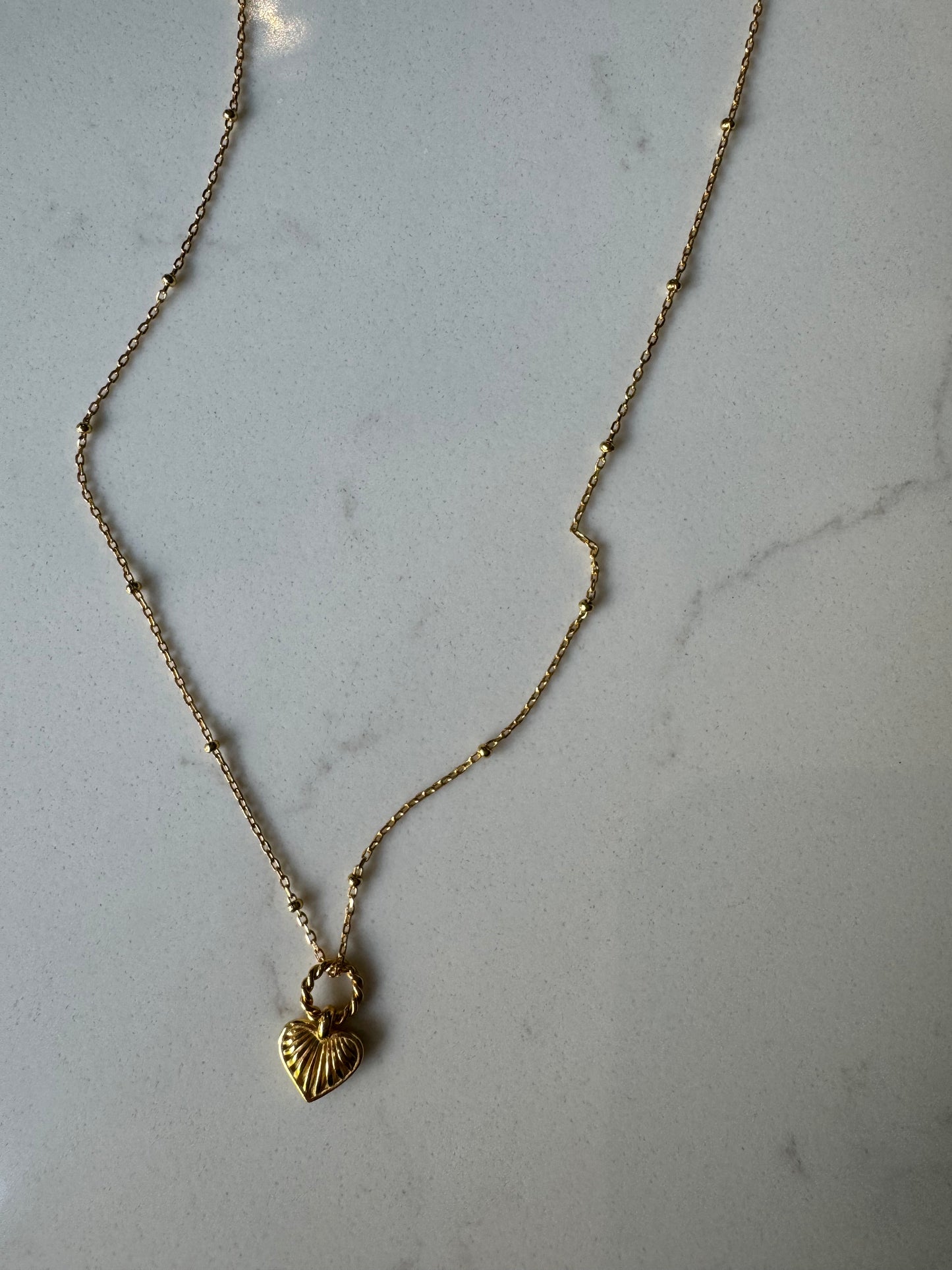 Gold heart pendant 67