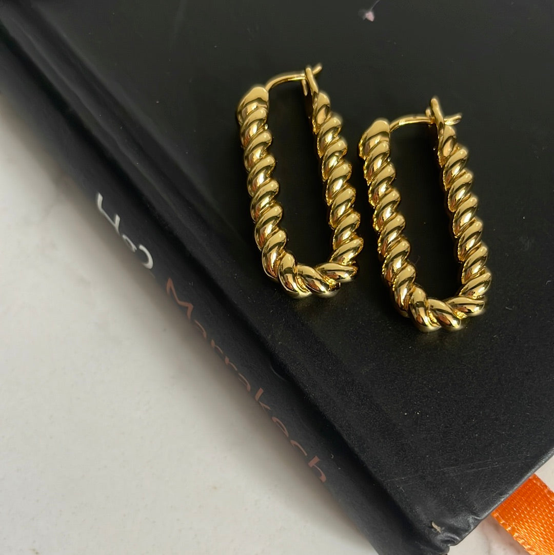 Gold ridged oval hoops 25