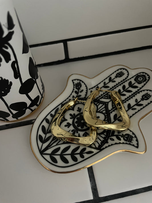Large gold twisted triangle earring 36