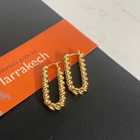 Gold ridged oval hoops 25