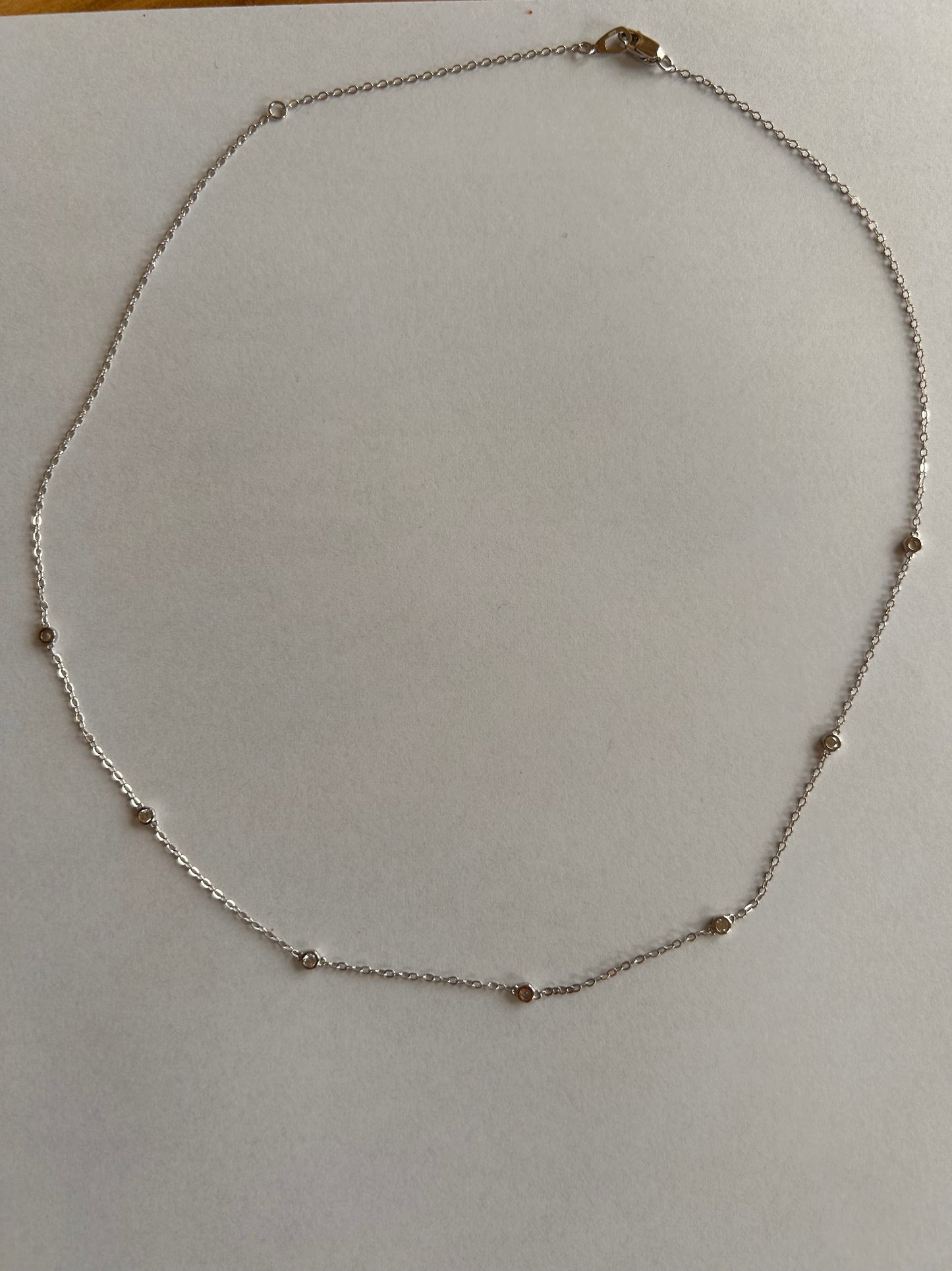 Silver diamanté charm necklace 19