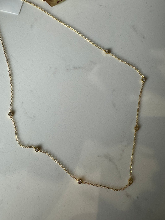 Gold diamanté charm necklace 63